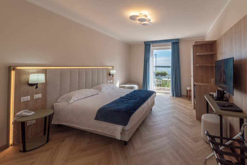 Deluxe Double or Twin Room, 1 King Bed, Lake View | Down comforters, minibar, in-room safe, desk