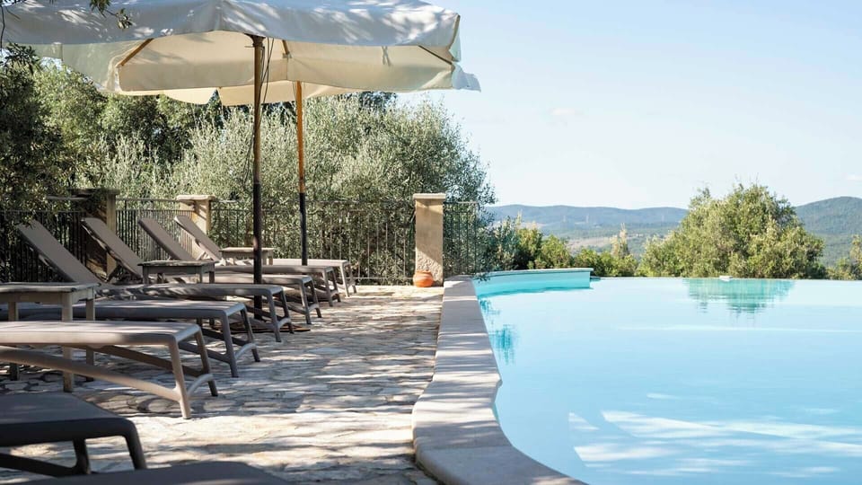 Seasonal outdoor pool, pool umbrellas, sun loungers
