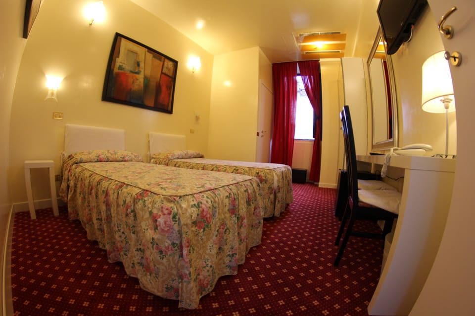 Double or Twin Room | Down comforters, in-room safe, desk, blackout drapes