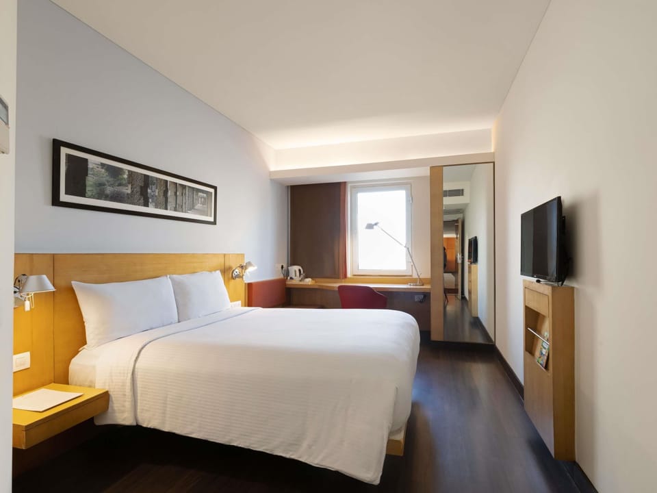 Premium bedding, memory foam beds, minibar, in-room safe