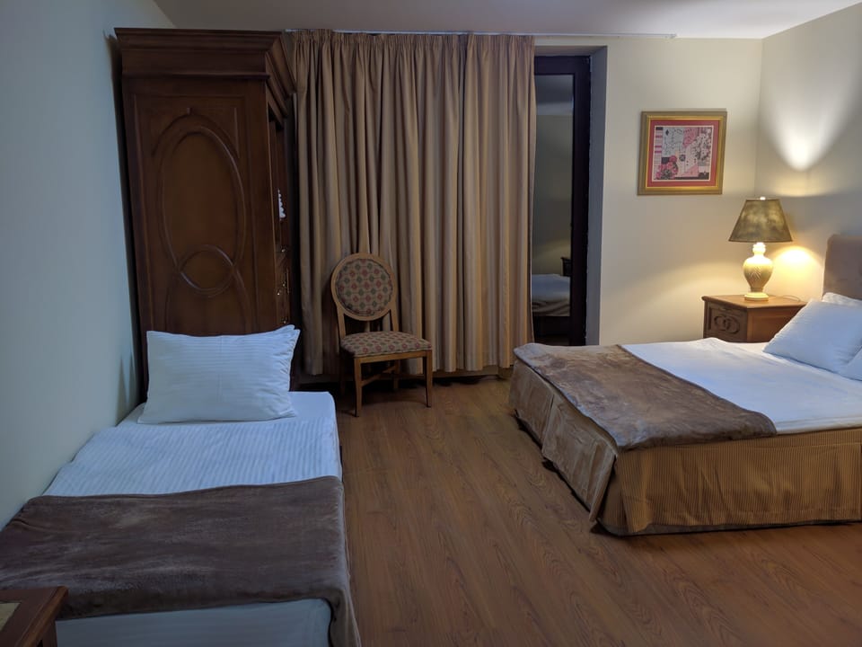 Triple Room, Balcony | Cribs/infant beds, rollaway beds, free WiFi, bed sheets