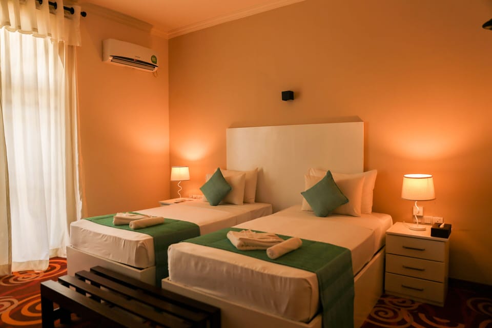Premium bedding, memory foam beds, minibar, iron/ironing board