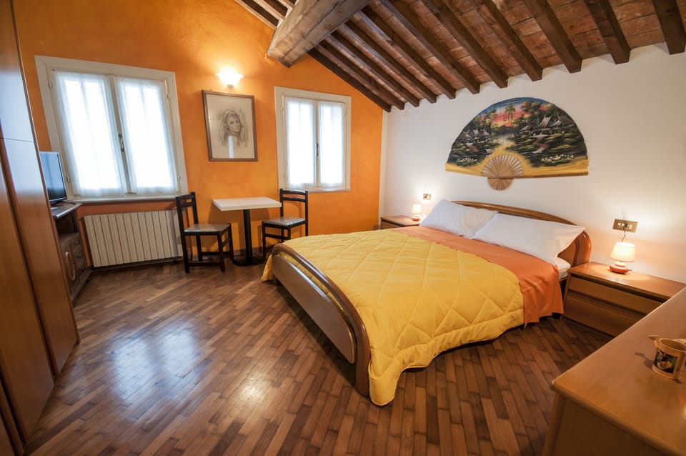 Suite, 2 Bedrooms, Garden View | Minibar, soundproofing, free cribs/infant beds, free WiFi