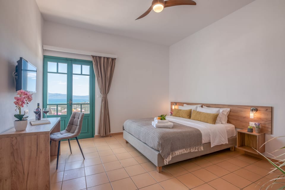 Double Room, Sea View | Free minibar, in-room safe, desk, laptop workspace