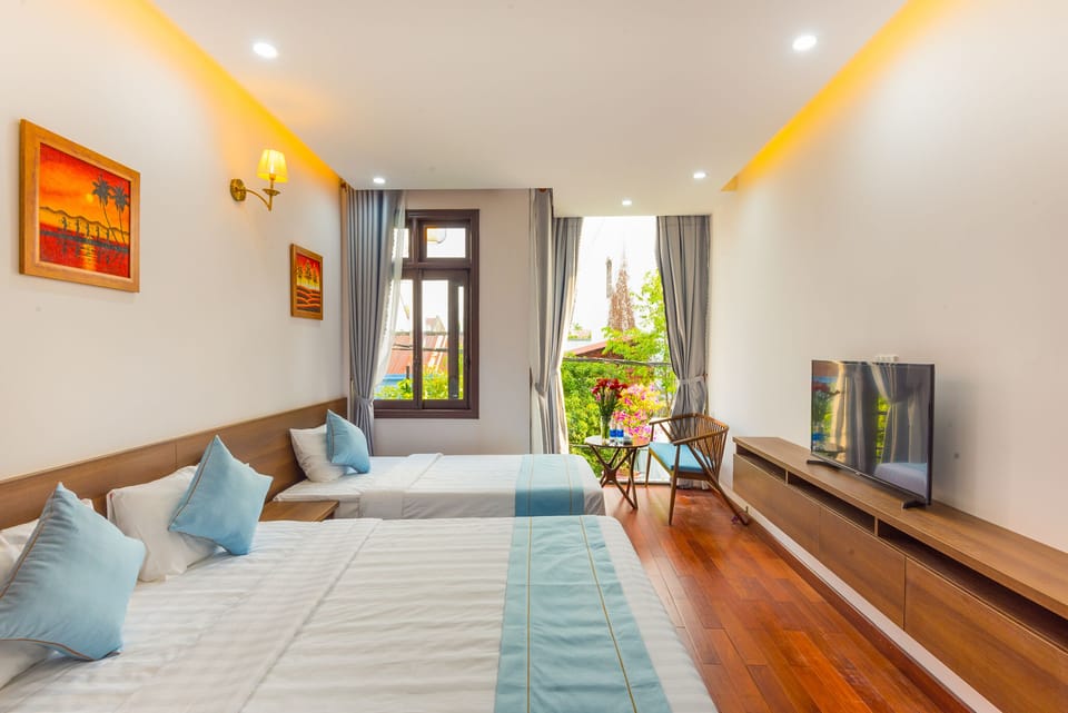 Family Room | Minibar, desk, blackout drapes, free WiFi