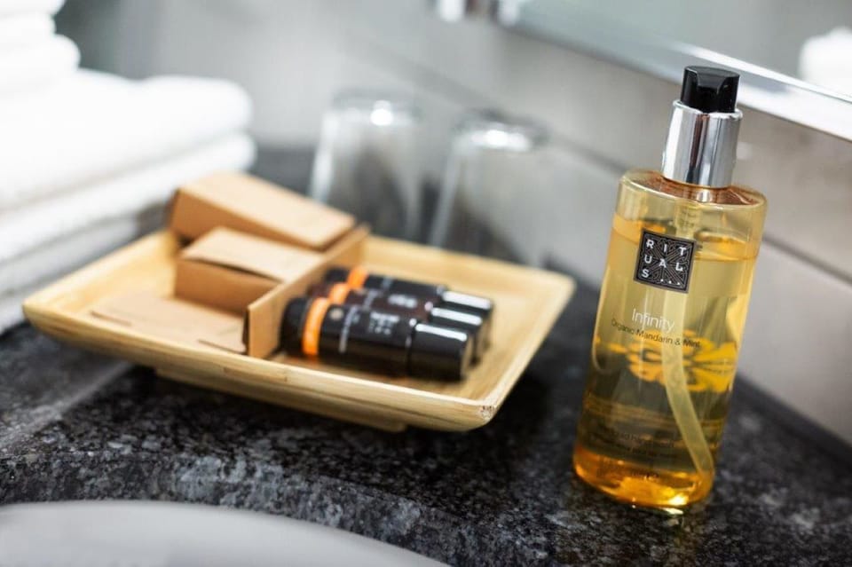 Shower, free toiletries, hair dryer, slippers