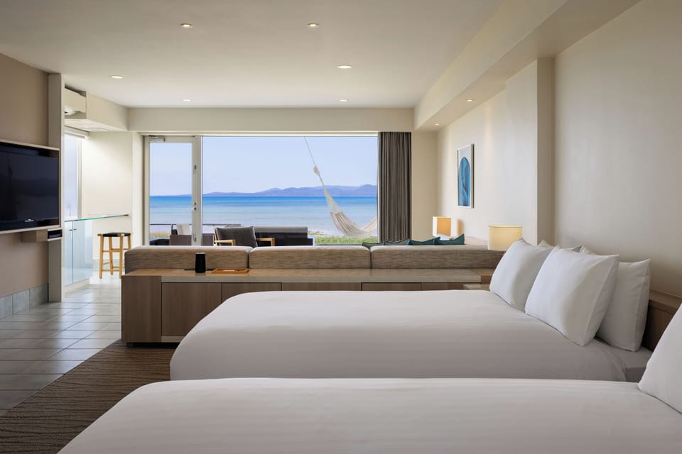 Ocean View Suite | Down comforters, in-room safe, blackout drapes