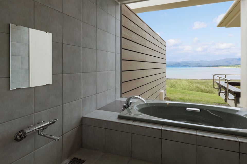 Ocean View Suite | Bathroom | Combined shower/tub, deep soaking tub, hydromassage showerhead
