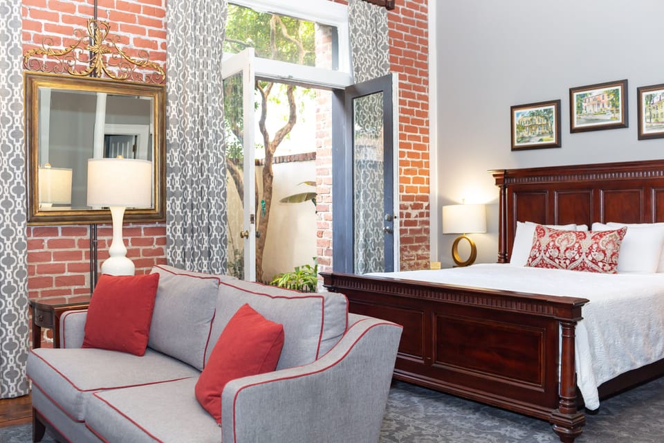 Suite, 1 King Bed, Patio | In-room safe, desk, laptop workspace, blackout drapes