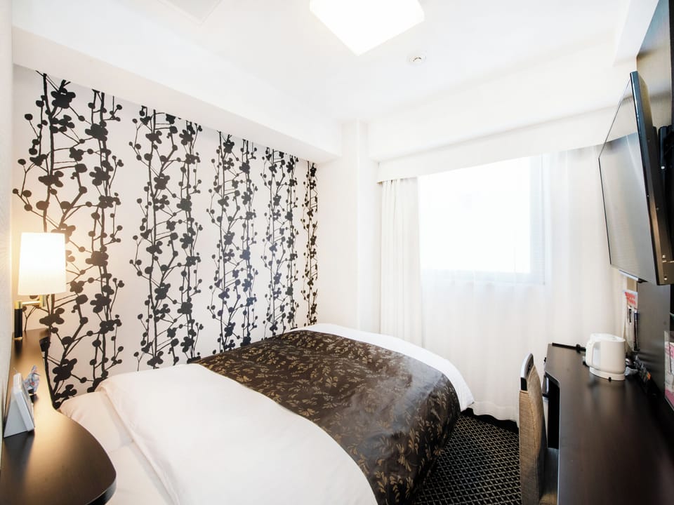 Standard Single Room | Down comforters, desk, blackout drapes, free WiFi