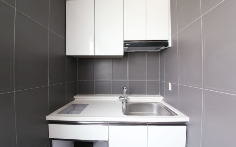 Royal Suite Residence Pension | Private kitchenette | Mini-fridge, microwave, coffee/tea maker, electric kettle