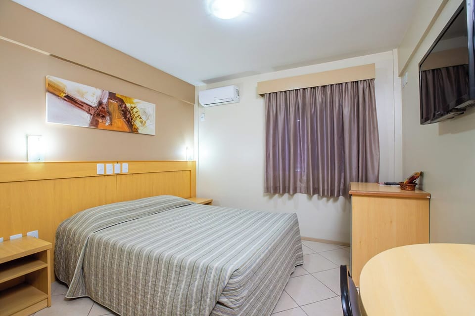 Standard Double Room, 1 Double Bed | Minibar, in-room safe, desk, blackout drapes