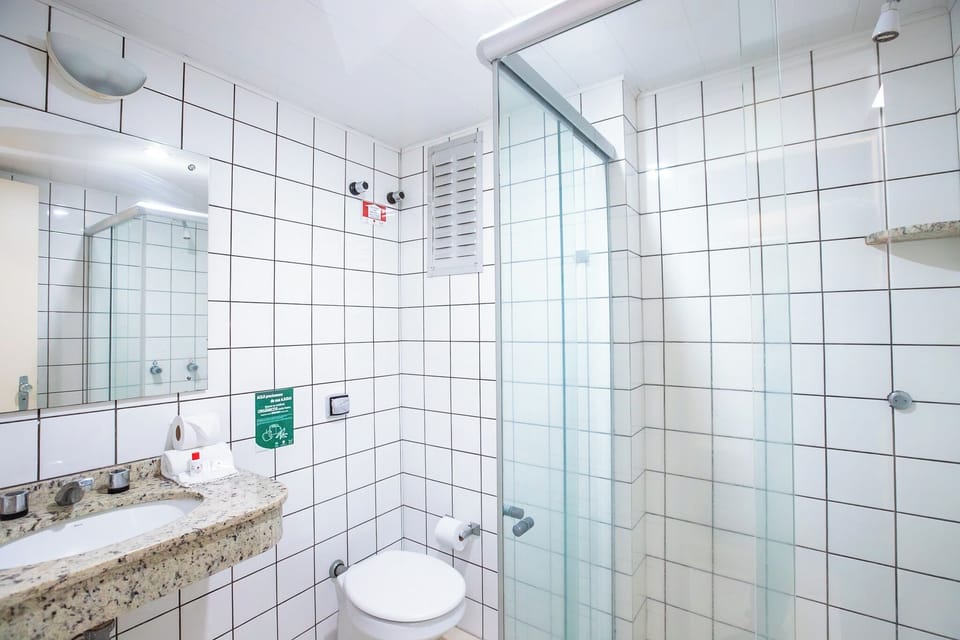 Standard Double Room, 1 Double Bed | Bathroom | Shower, hair dryer, towels, soap