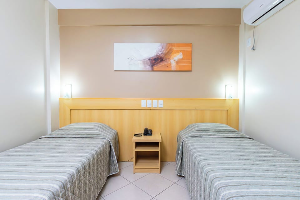 Standard Twin Room, 2 Twin Beds | Minibar, in-room safe, desk, blackout drapes