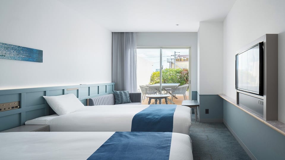 Garden View Twin Room, Non Smoking | In-room safe, desk, laptop workspace, blackout drapes