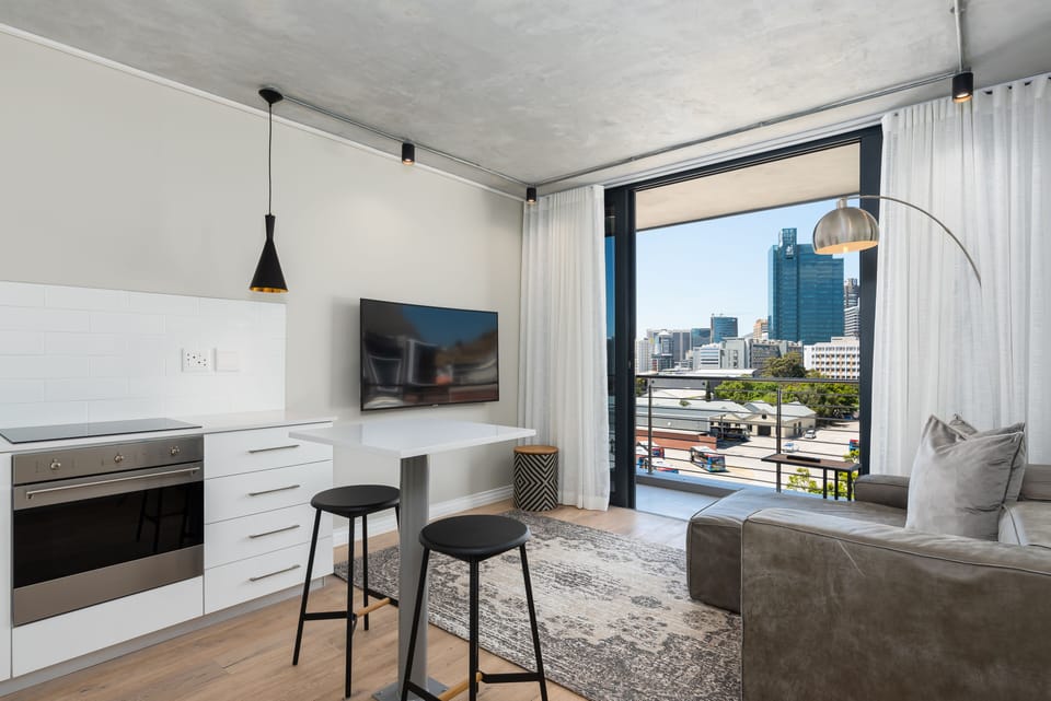 Signature Apartment | Living area | Flat-screen TV, Netflix, streaming services