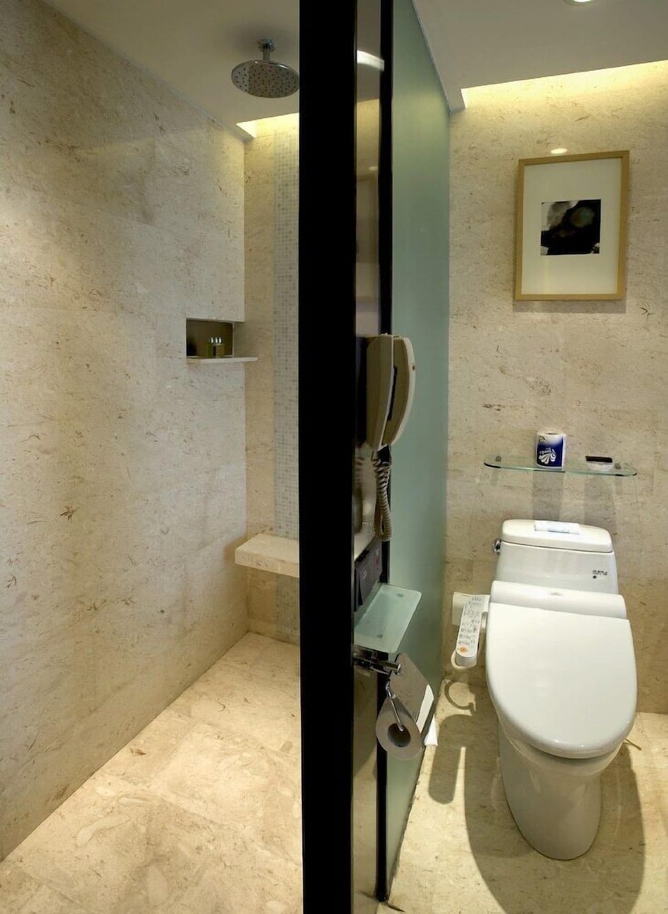 Combined shower/tub, deep soaking tub, designer toiletries, hair dryer
