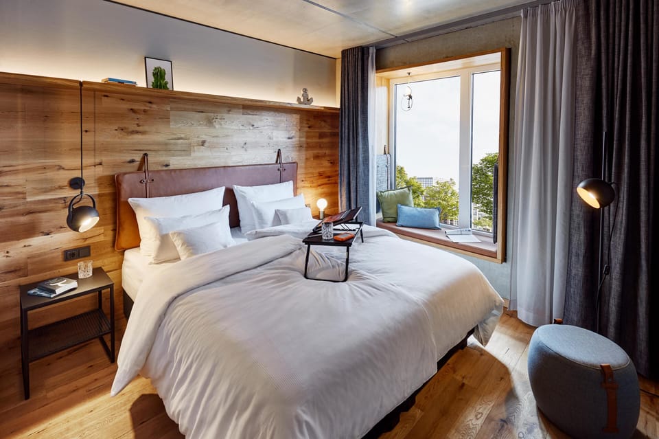 Room, 1 King Bed | Free minibar, in-room safe, laptop workspace, blackout drapes