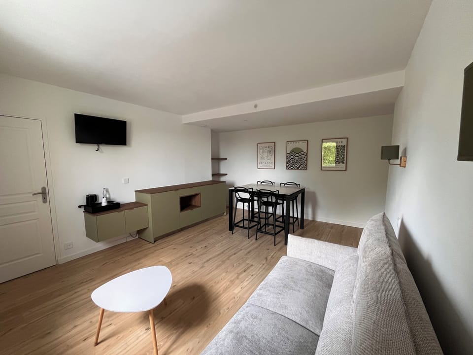 Studio Suite | Premium bedding, Select Comfort beds, desk, iron/ironing board