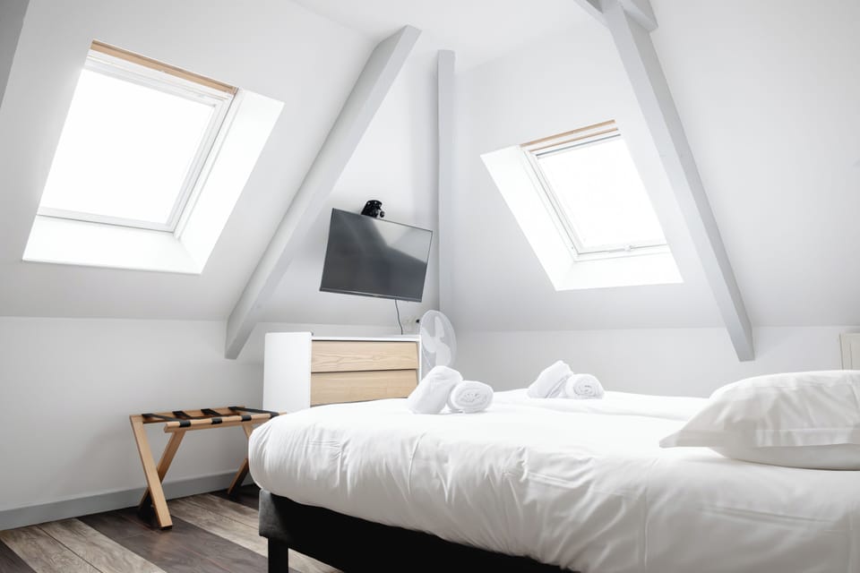 Standard Triple Room | Premium bedding, Select Comfort beds, desk, iron/ironing board