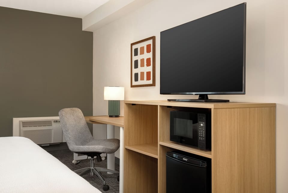 Desk, free WiFi, bed sheets, alarm clocks