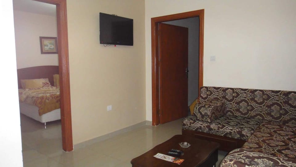 32-inch flat-screen TV with satellite channels, TV