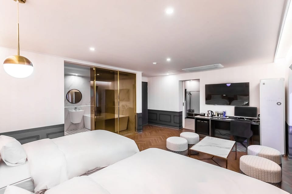 Family Suite, 2 Bedrooms, Balcony, City View | Minibar, desk, soundproofing, free WiFi