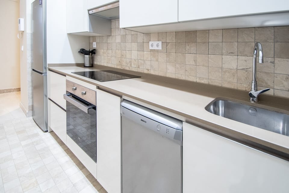 Deluxe Apartment | Private kitchen | Coffee/tea maker, full-size fridge, microwave, oven