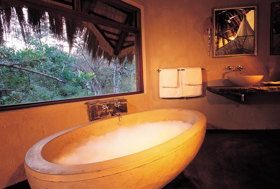 Rock Suite | Bathroom | Separate tub and shower, deep soaking tub, designer toiletries