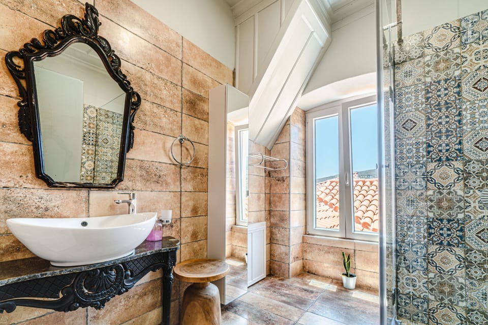 Suite, 2 Bedrooms, Hot Tub, Oceanfront (Split Level) | Bathroom | Shower, hair dryer, bathrobes, slippers