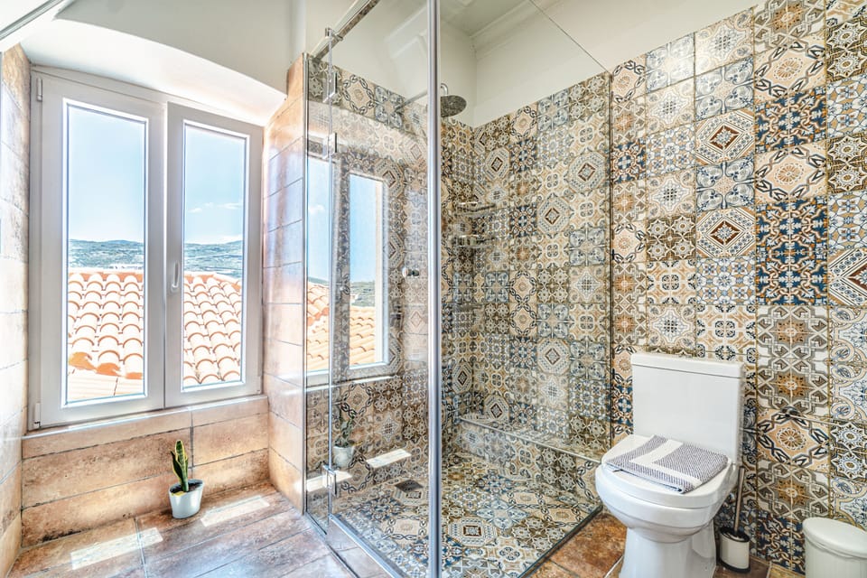 Suite, 2 Bedrooms, Hot Tub, Oceanfront (Split Level) | Bathroom | Shower, hair dryer, bathrobes, slippers