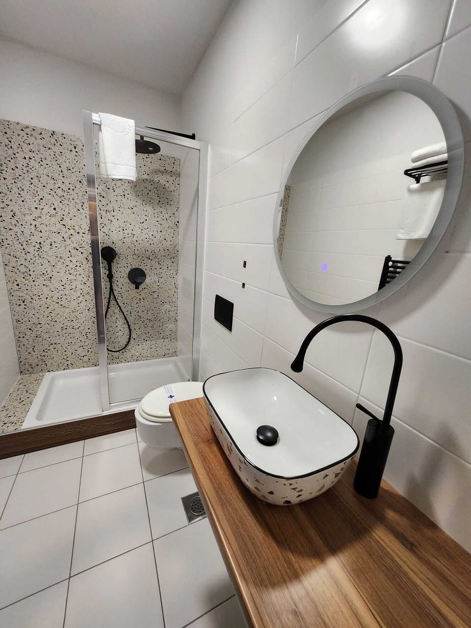 Shower, free toiletries, hair dryer, towels