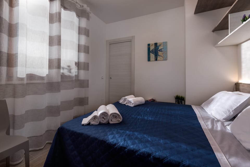 Apartment, 2 Bedrooms | 2 bedrooms, cribs/infant beds, free WiFi