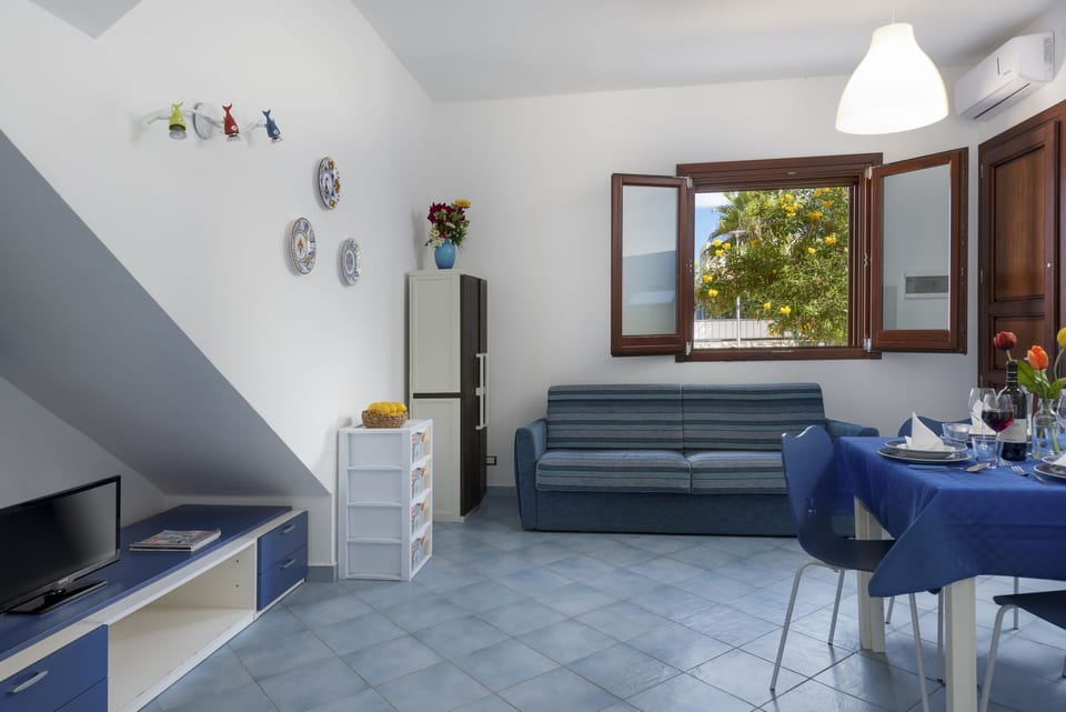 Apartment, 1 Bedroom | Living area | LCD TV