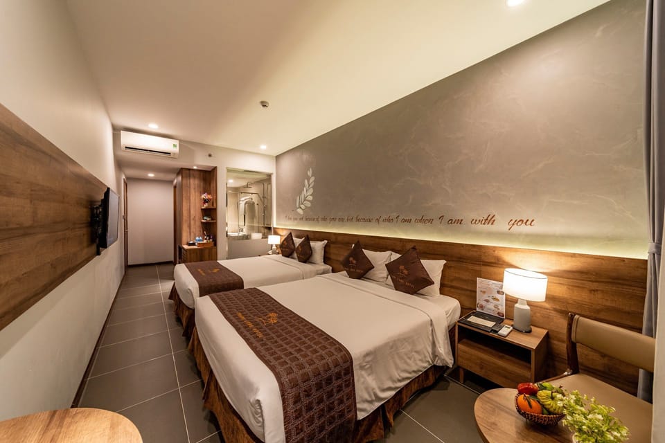 Family Triple Room | Premium bedding, minibar, individually decorated, individually furnished