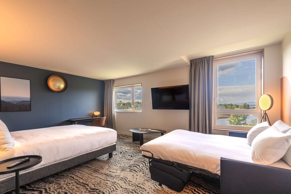 Junior Suite, 1 King Bed, Lake View | Premium bedding, in-room safe, desk, laptop workspace