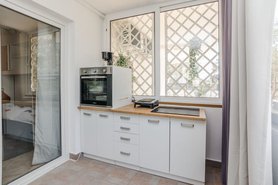 Apartment, 2 Bedrooms A1 | Private kitchen | Fridge, microwave, stovetop, dishwasher