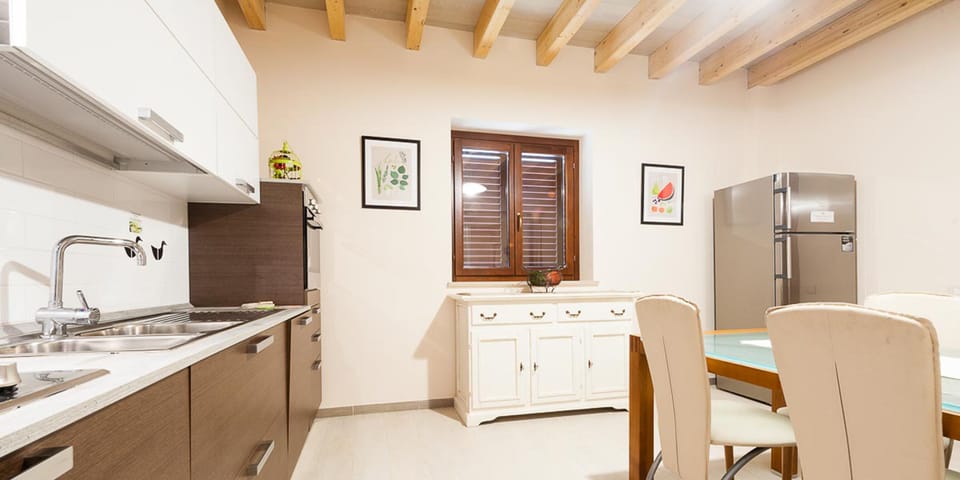 Apartment, 3 Bedrooms | Private kitchen | Fridge, microwave, oven, stovetop