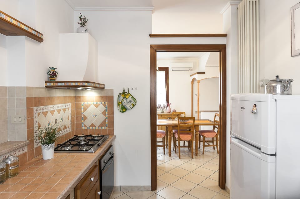 Apartment, 4 Bedrooms | Private kitchen | Fridge, microwave, oven, stovetop