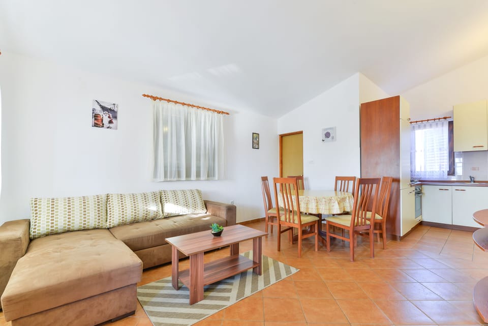 Apartment, 2 Bedrooms A1 | Living area | Flat-screen TV