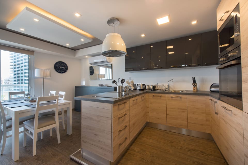 Apartment (1 Bedroom) | Private kitchen | Full-size fridge, microwave, oven, dishwasher