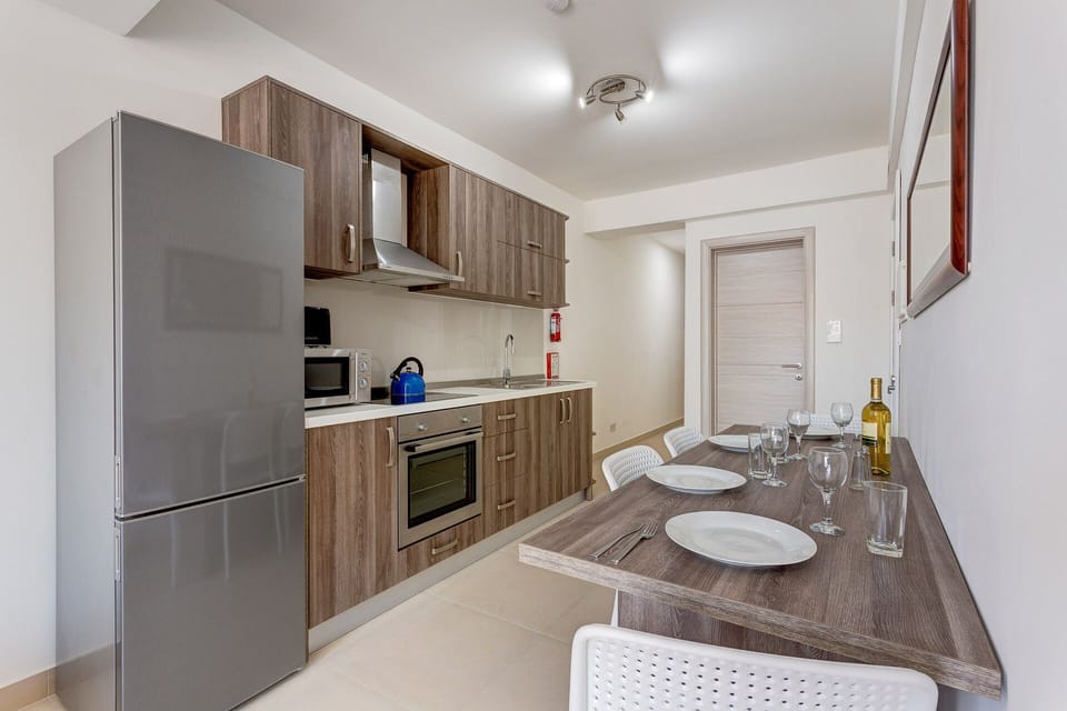 Apartment (1 Bedroom) | Private kitchen | Full-size fridge, microwave, oven, dishwasher