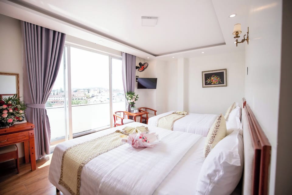 Family Quadruple Room, Lake View | Hypo-allergenic bedding, minibar, desk, laptop workspace