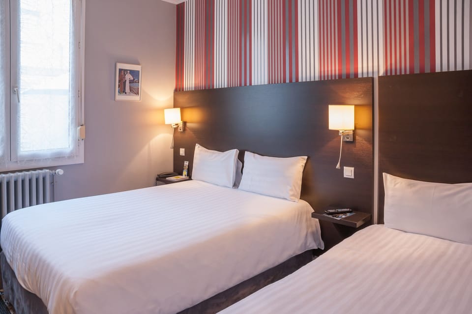 Twin Room | Premium bedding, desk, blackout drapes, soundproofing