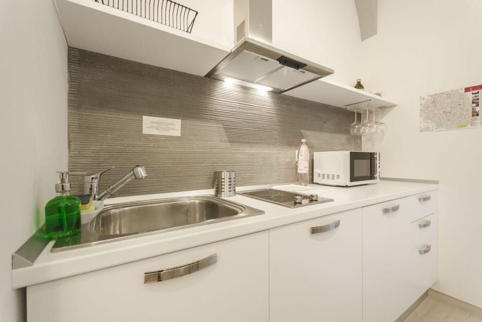 Apartment, 1 Bedroom | Private kitchen | Microwave, stovetop, espresso maker, coffee/tea maker