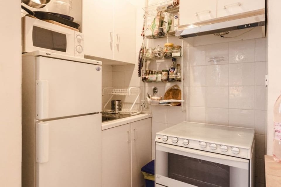 Apartment, 2 Bedrooms | Private kitchen | Full-size fridge, microwave, oven, stovetop