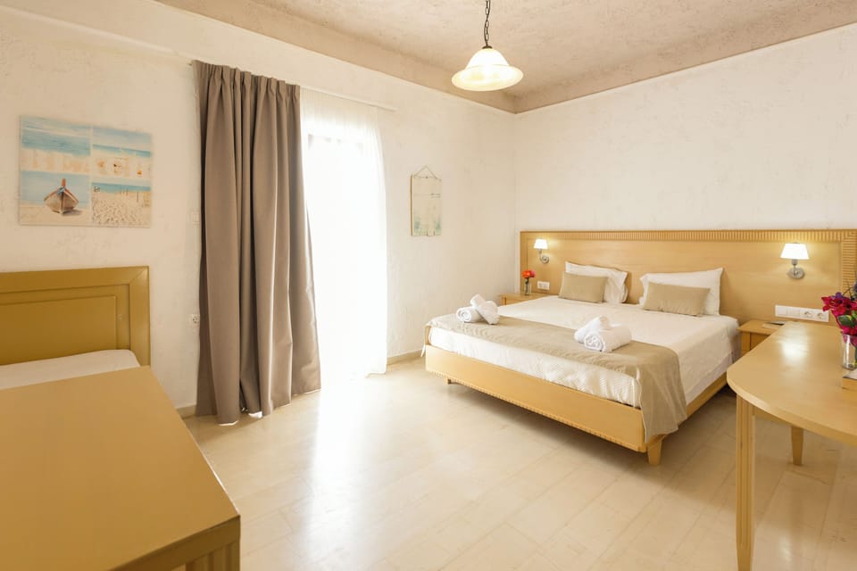 Standard Double Room | Desk, iron/ironing board, bed sheets