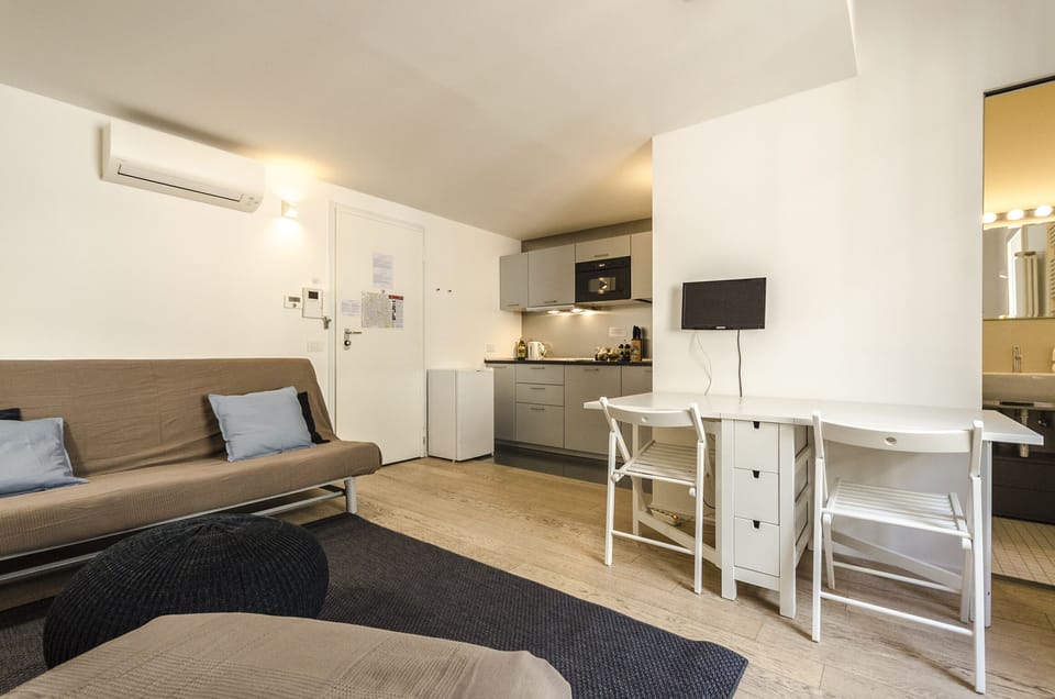 Apartment, 1 Bedroom | Living area | Flat-screen TV