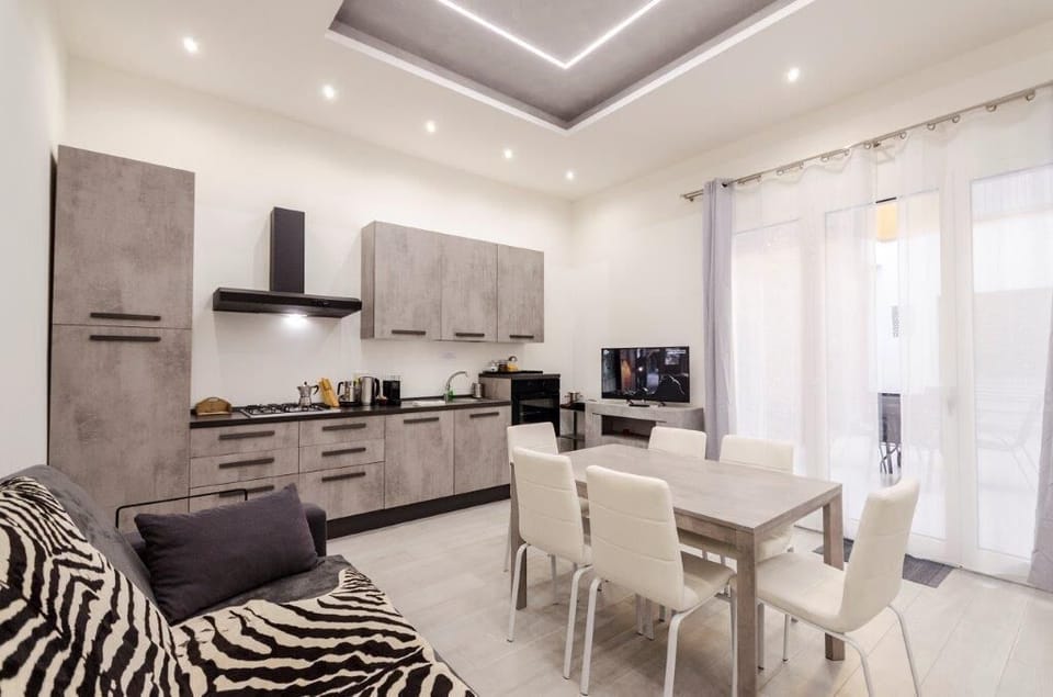 Apartment, 2 Bedrooms | Living area | 42-inch flat-screen TV with digital channels, TV