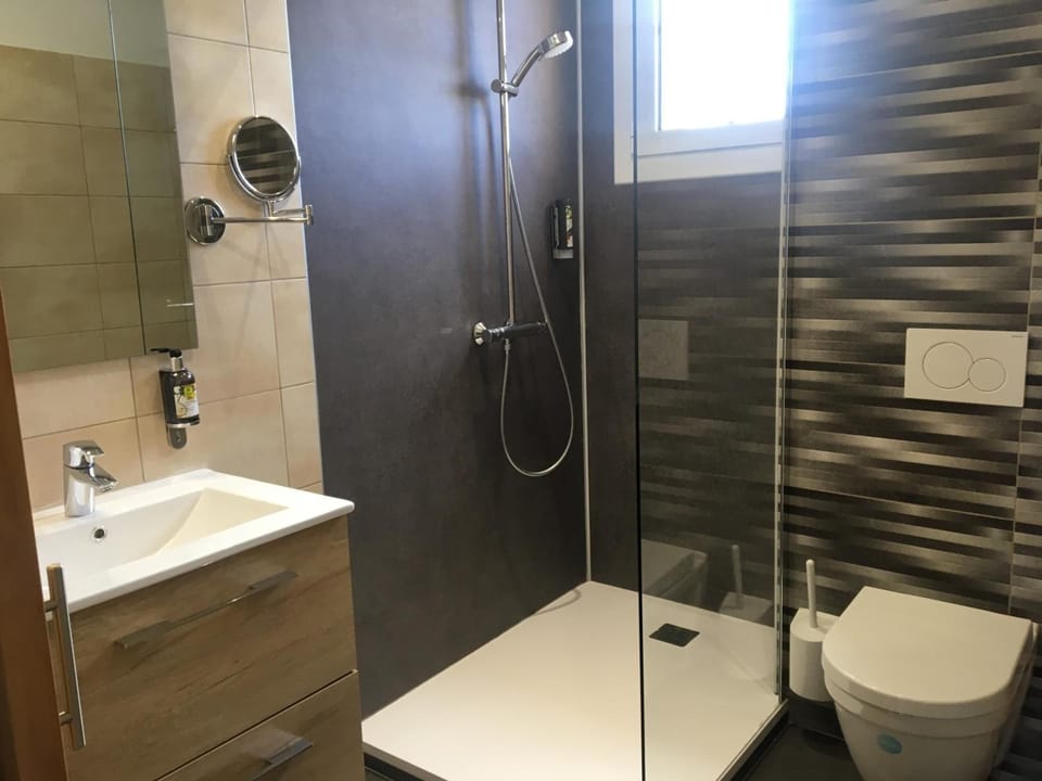 Shower, free toiletries, hair dryer, towels
